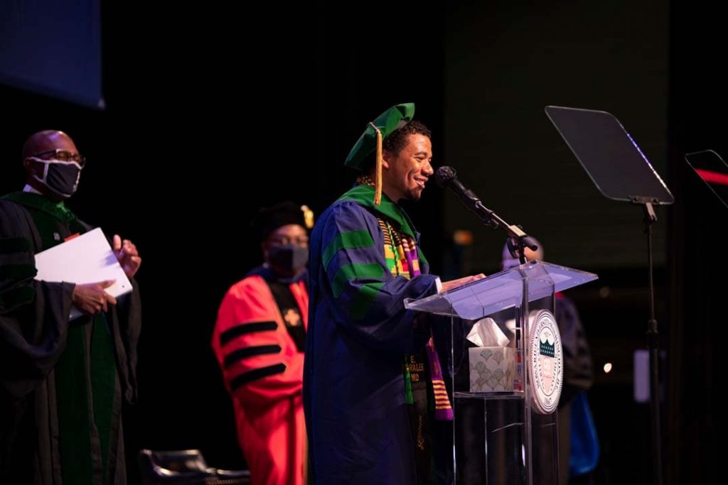 Dr. Justin Morales, President of the Class of 2021, thanking Mike Bloomberg while addressing his fellow graduates at Howard University College of Medicine